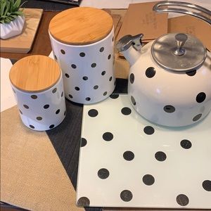 Cutting board, tea kettle, and canisters